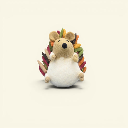 wool felt hedgehog ornament detail — hand-needled quills and stitched face