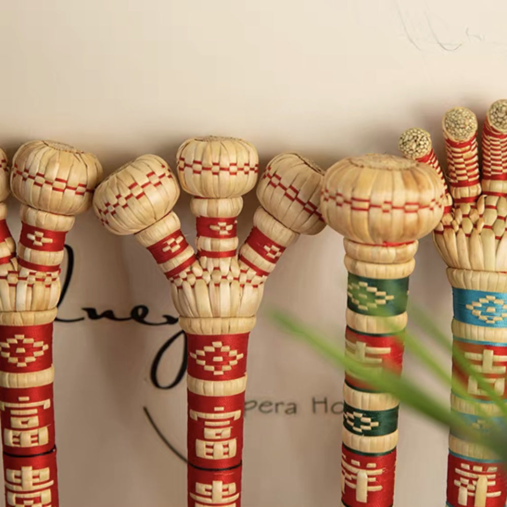 single-, double-, and triple-head sorghum hammers standing upright side by side, uggaz