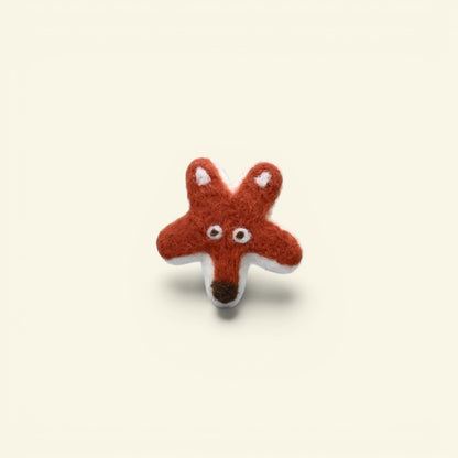 the felt fox – star-shaped wool felt fox brooch, rust and white, handmade in nepal, uggaz