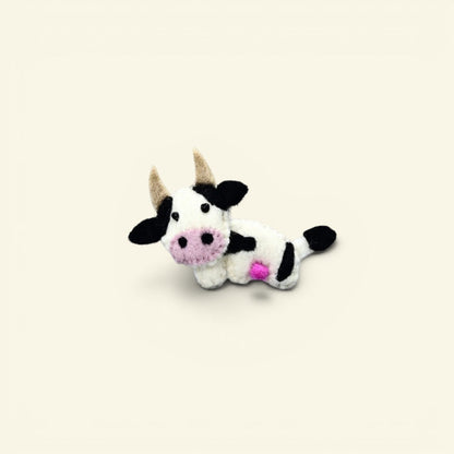 the felt farm – wool felt dairy cow brooch, black and white with a pink nose, needle-felted in nepal, uggaz