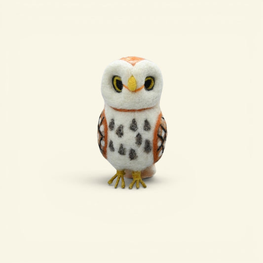 wool felt owl ornament detail — hand-needled facial disc and beak