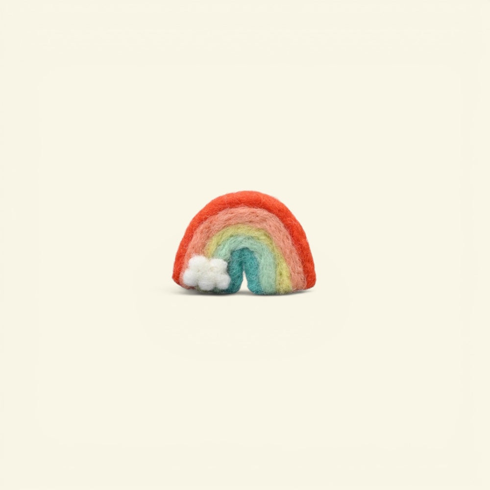 handmade wool felt rainbow brooch, sunset colorway — tangerine, peach, yellow and sea green arches with a tiny white cloud, needle-felted in nepal