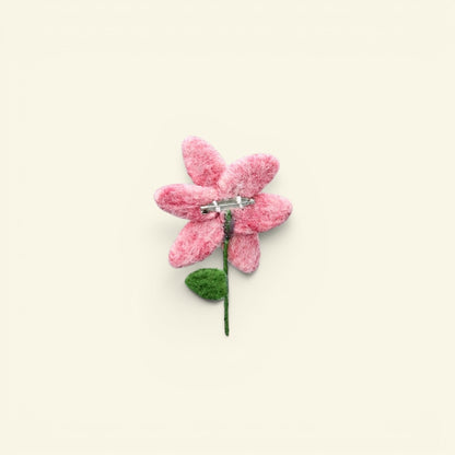 wool felt pink flower brooch detail — hand-needled petals in mottled pink wool