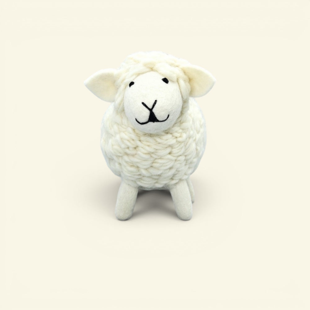 wool sheep ornament detail — hand-knit fleece and stitched face