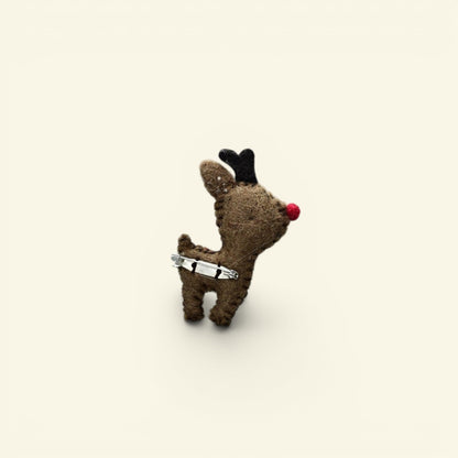wool felt reindeer brooch detail — hand-needled antlers and red nose