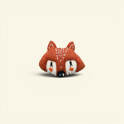 handmade wool felt fox face brooch — rust and cream, needle-felted in nepal
