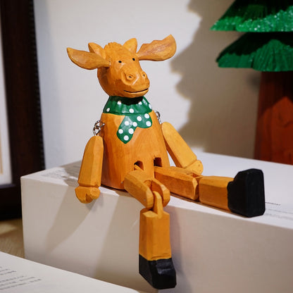 the winter legs – reindeer in a green scarf, hand-carved basswood christmas figurine, uggaz