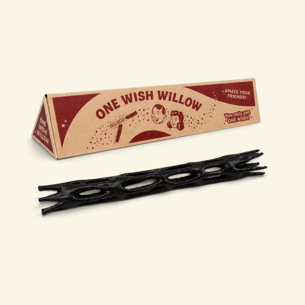 black one wish willow lattice snap stick in front of its triangular printed box