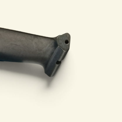 the blade root from another angle, with the small air hole at its base