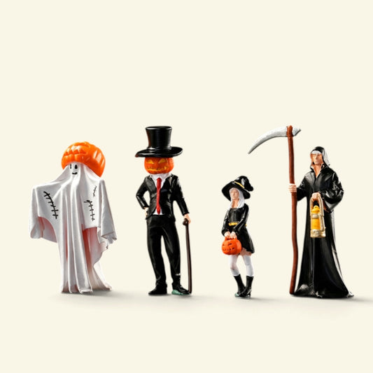 four 1:64 scale halloween figures in a row on a cream background: a ghost with a pumpkin head, a top-hat gentleman with a jack-o'-lantern face, a little witch with a pumpkin bucket, and a hooded reaper with a scythe and a lantern