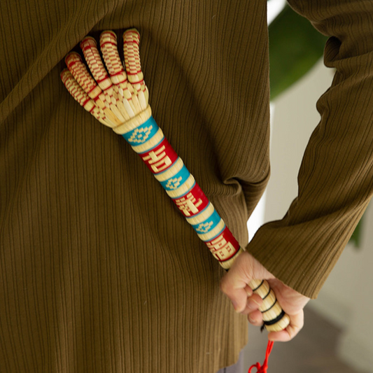 the sorghum hand tucked into a coat pocket, uggaz