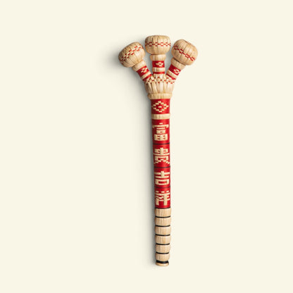 the sorghum hammer, triple-head style, standing upright on a cream background, uggaz