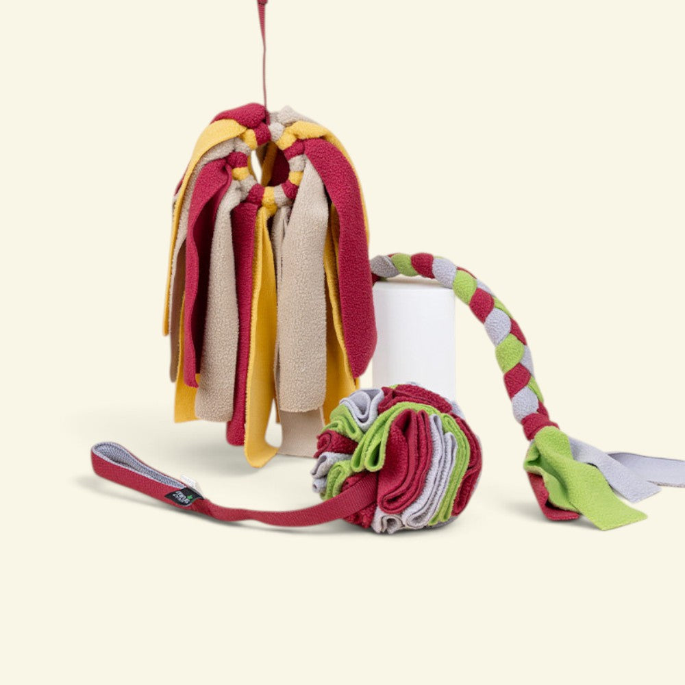 UggaZ fleece tug rope and drag mop dog toys side by side, studio shot