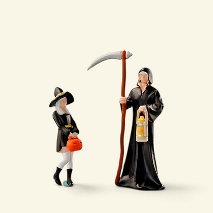the little witch and the reaper side by side on a cream background, showing their height difference at 1:64 scale