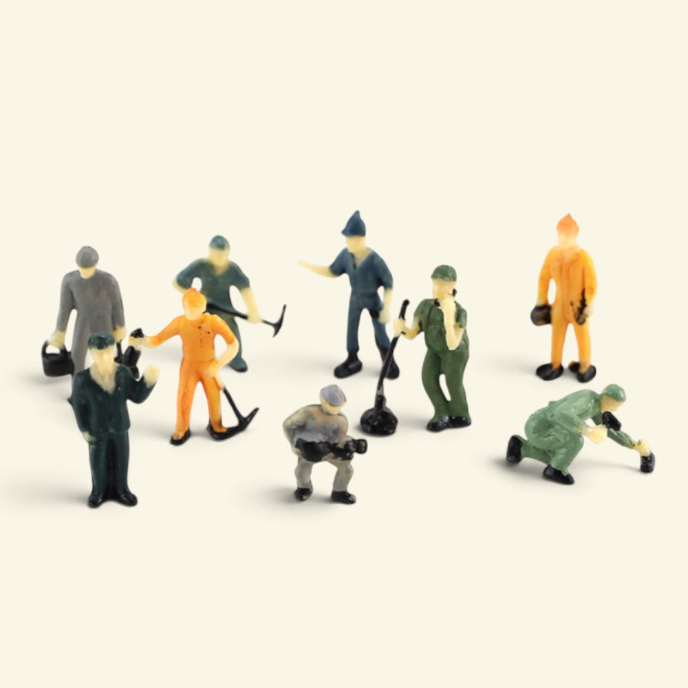 close group of painted 1:87 workers, one crouching, others carrying tools and cans