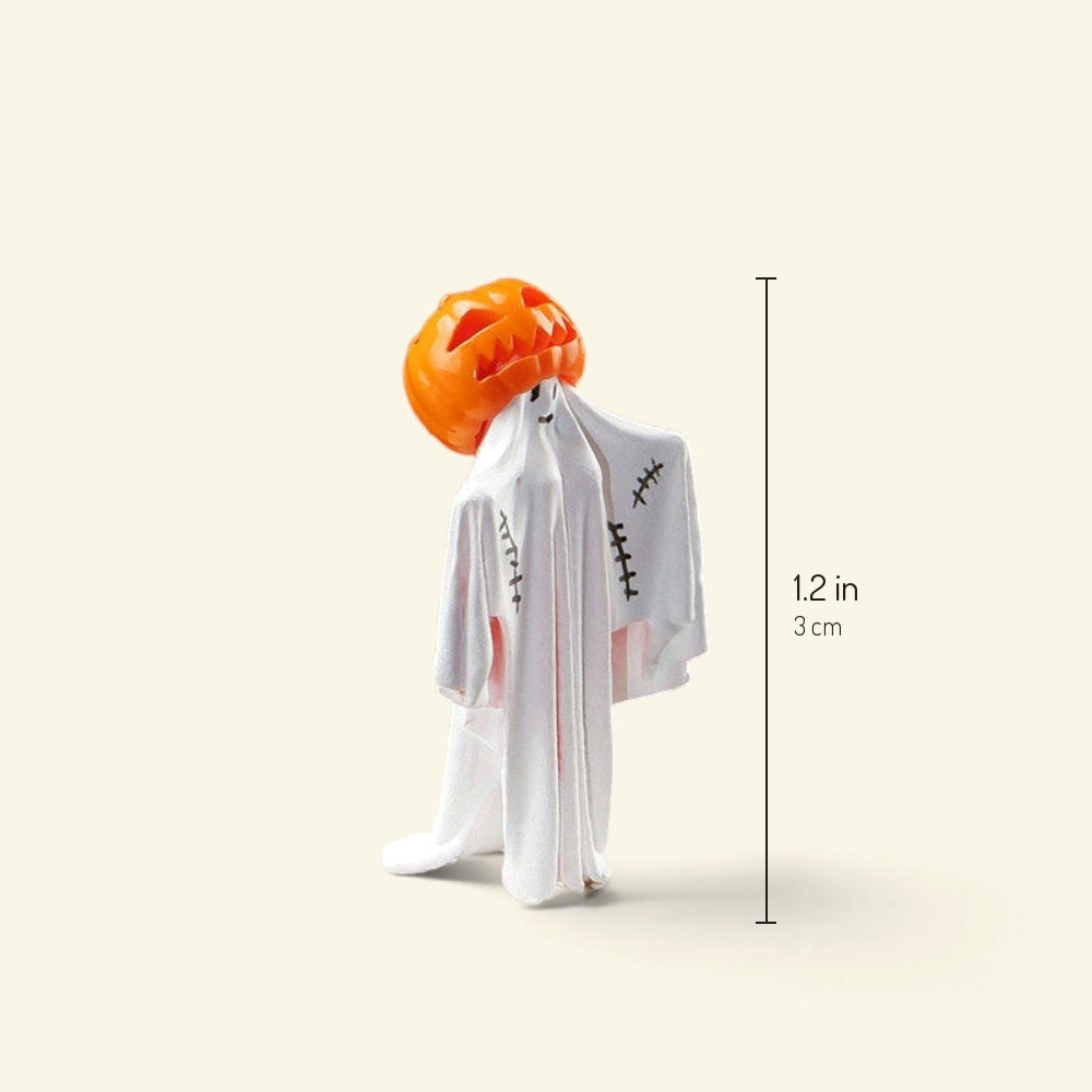 miss ghost, a 1:64 figure in a white stitched sheet with a carved pumpkin head, about 1.2 in / 3 cm tall