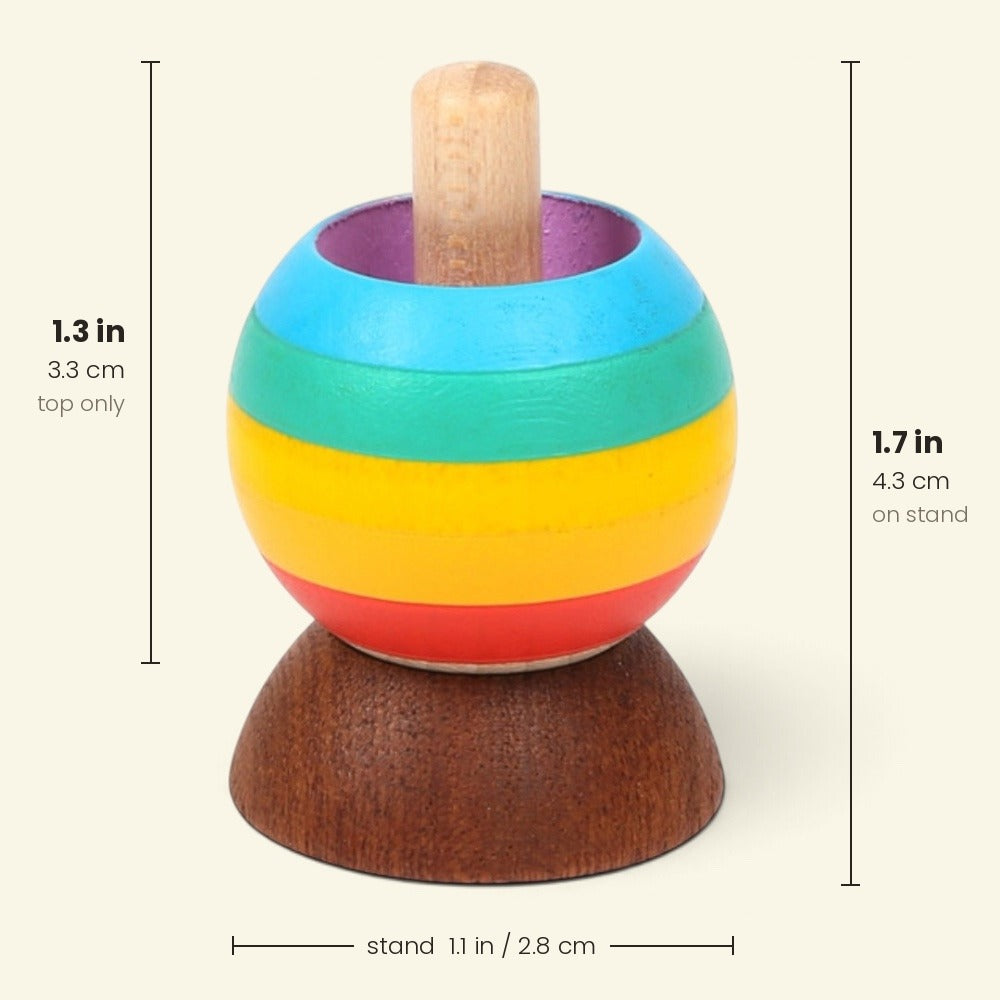 size chart for the rainbow tippe top: top alone 1.3 in / 3.3 cm tall, 1.7 in / 4.3 cm tall on its stand, stand 1.1 in / 2.8 cm across